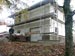 Maison en bois : Bardage en cours de finition