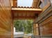 Maison en bois : Passage entre les deux corps de bâtiment